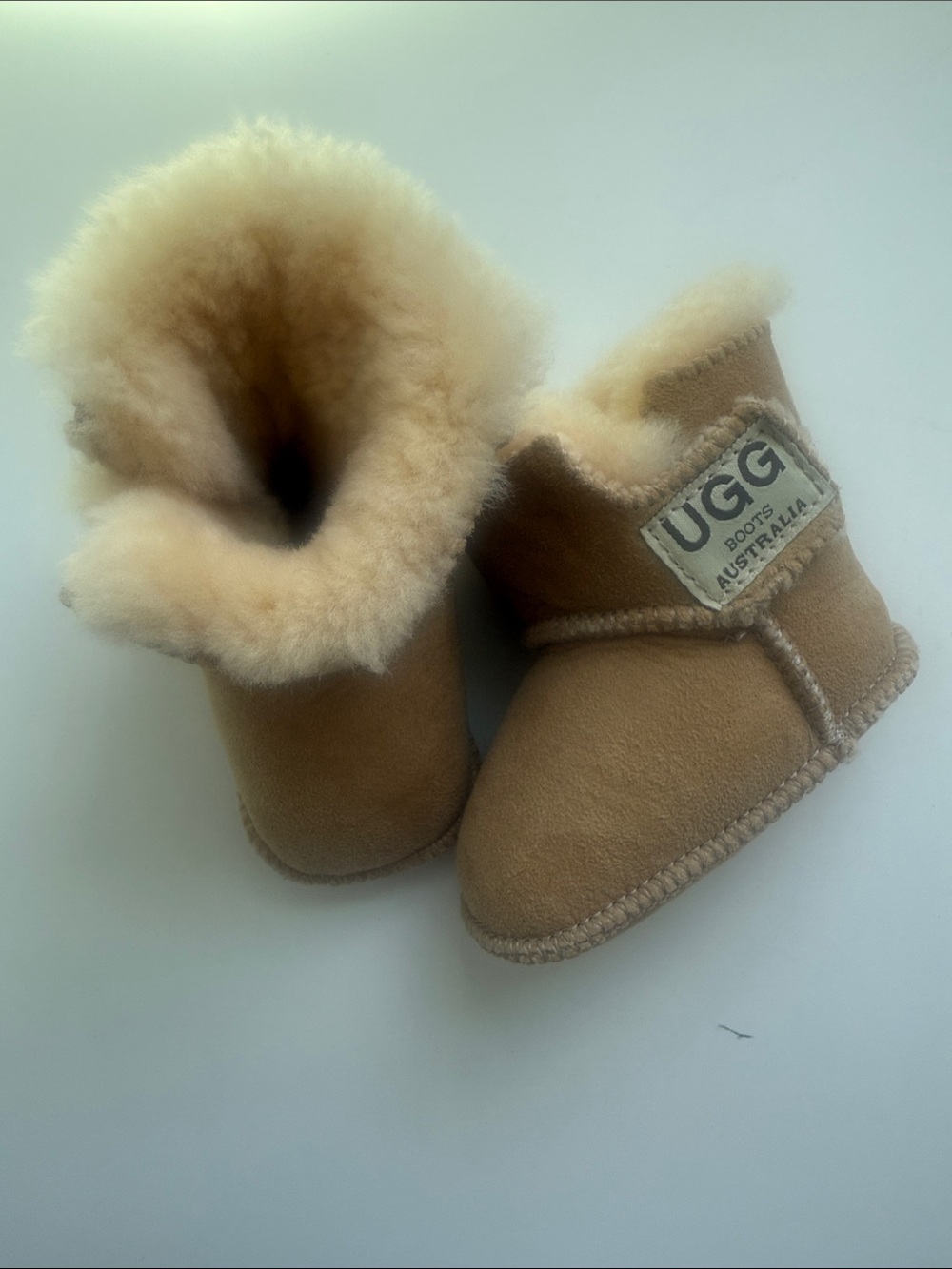 UGG Kids Mini Booties in Chestnut / Cream